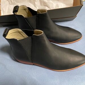 Nisolo Black Leather Chelsea Booties with Brown Trim
